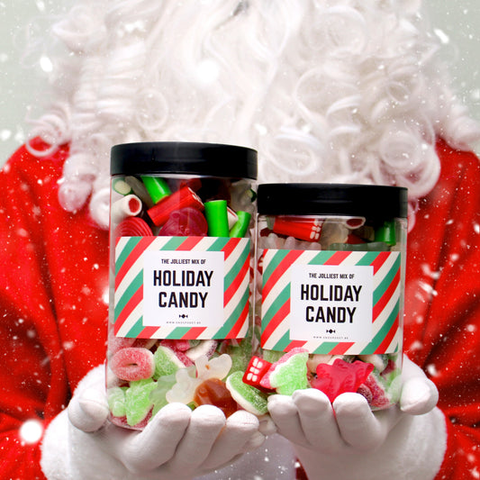 Kerstmis Candy Jar gevuld met kerstfiguurtjes, gekleurde snoepstaafjes en winterse snoepjes
