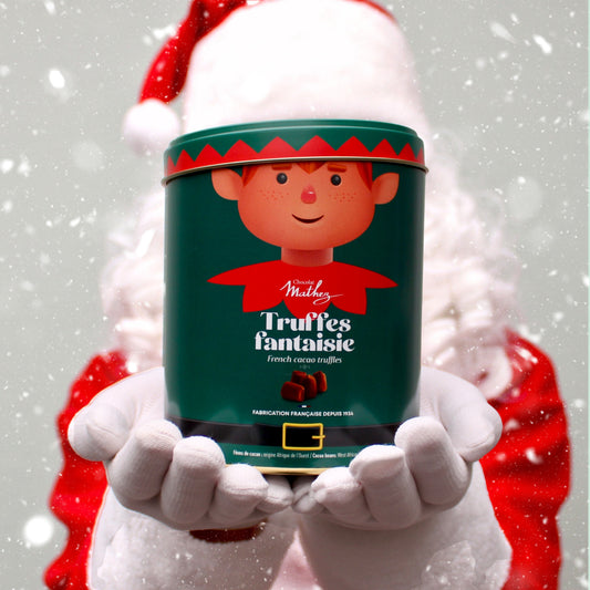 Tinnen kerstblik met afbeelding van kerstelfje, gevuld met Franse chocoladetruffels
