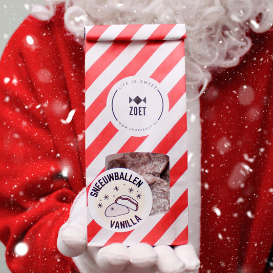 Zakje gevuld met Belgische sneeuwballen (rotte patatten) met chocolade en poedersuiker
